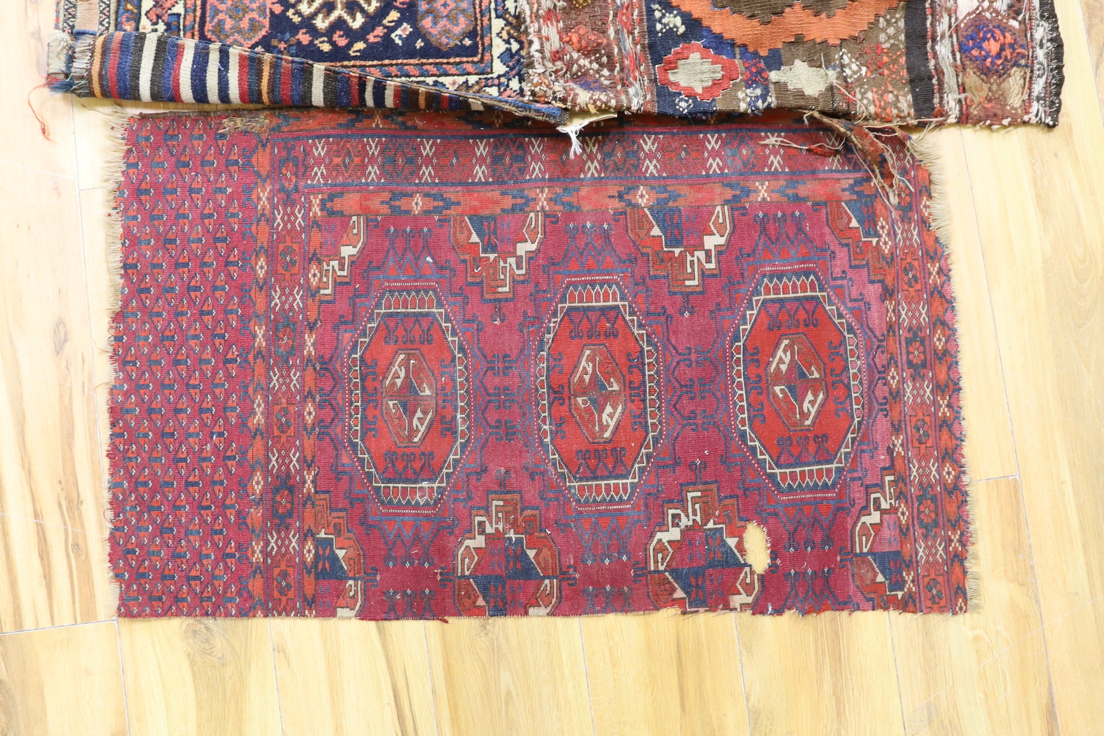 Two carpet saddlebags: Kasquai and a Shamdavan salt bag, a Kilim panel, a Soumac and a Tekke fragment